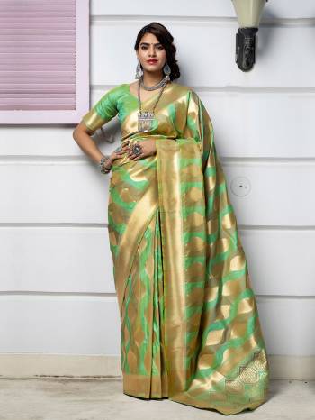 Adorn The Pretty Angelic Look Wearing This Heavy Designer Wevon Saree In Green Color Paired With Green Colored Blouse. This Saree Is Fabricated On Banarasi Silk Paired With Blouse. Its Pretty Color Pallete Will Give An Attractive Look To Your Personality. 