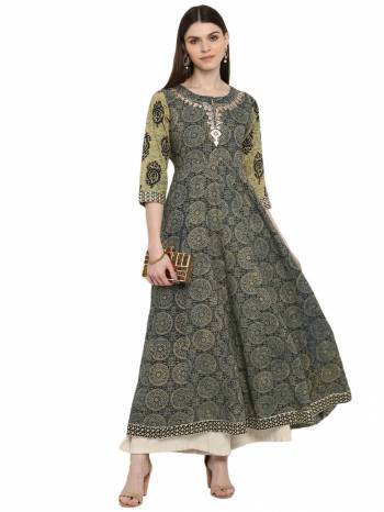 Grab This Readymade Long Kurti In Fine Color Fabricated On Cotton Beautified With Printed And Embroidery Work. It Is Light In Weight And Easy To Carry All Day Long. 