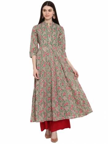 Grab This Readymade Long Kurti In Fine Color Fabricated On Cotton Beautified With Printed And Embroidery Work. It Is Light In Weight And Easy To Carry All Day Long. 