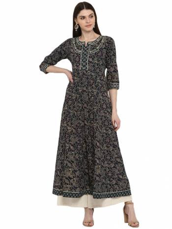 Grab This Readymade Long Kurti In Fine Color Fabricated On Cotton Beautified With Printed And Embroidery Work. It Is Light In Weight And Easy To Carry All Day Long. 