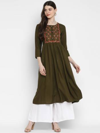 This Readymade Kurti With Embroidery In Fine Color Fabricated On Rayon Beautified With Printed. It Is Light In Weight And Easy To Carry All Day Long. 