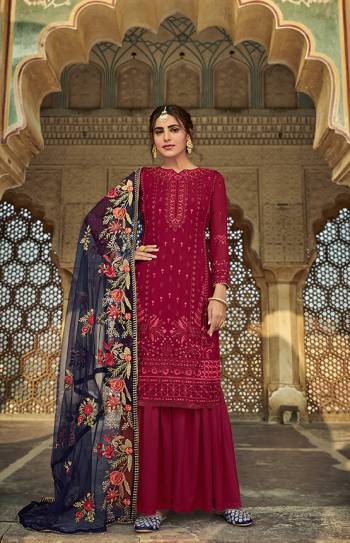 Here Is A Very Pretty Designer Straight Suit In Maroon Color And Dupatta In Nevy Blue . Its?Embroidered Top Are Faux Georgette and Dupatta Are Fabricated On Heavy Net Paired with Santoon Fabricated Bottom. Its Fabrics Are Soft Towards Skin And Esnures Superb Comfort All Day Long.