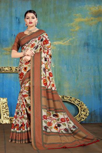 Adorn The Pretty Angelic Look Wearing This Designer Printed Saree In Fine Color Paired With Contrasting Blouse. This Saree Is Fabricated On Manipuri Cotton Paired With Blouse. Its Pretty Color Pallete Will Give An Attractive Look To Your Personality. 