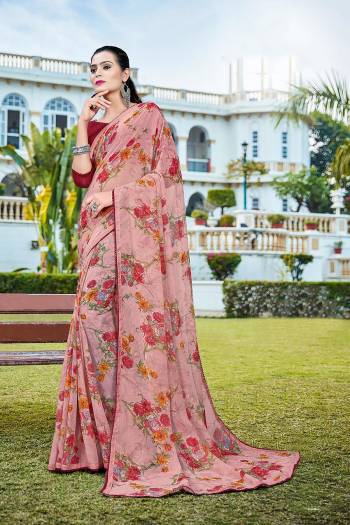 Grab This Pretty Elegant Looking Designer Printed Saree In Light Color Paired With Contrasting Colored Blouse. This Saree Are Chiffon And Blouse Are Silk Based Beautified With Printed. Buy Now.