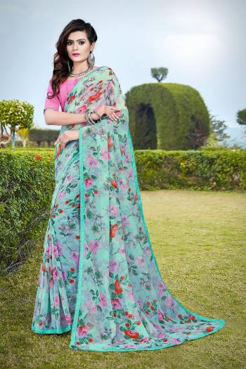 Grab This Pretty Elegant Looking Designer Printed Saree In Light Color Paired With Contrasting Colored Blouse. This Saree Are Chiffon And Blouse Are Silk Based Beautified With Printed. Buy Now.