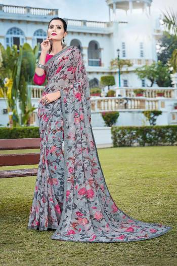 Grab This Pretty Elegant Looking Designer Printed Saree In Light Color Paired With Contrasting Colored Blouse. This Saree Are Chiffon And Blouse Are Silk Based Beautified With Printed. Buy Now.