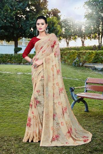 Grab This Pretty Elegant Looking Designer Printed Saree In Light Color Paired With Contrasting Colored Blouse. This Saree Are Chiffon And Blouse Are Silk Based Beautified With Printed. Buy Now.