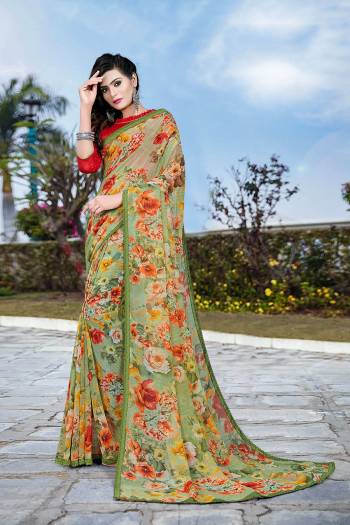 Grab This Pretty Elegant Looking Designer Printed Saree In Light Color Paired With Contrasting Colored Blouse. This Saree Are Chiffon And Blouse Are Silk Based Beautified With Printed. Buy Now.