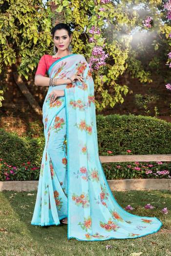 Grab This Pretty Elegant Looking Designer Printed Saree In Light Color Paired With Contrasting Colored Blouse. This Saree Are Chiffon And Blouse Are Silk Based Beautified With Printed. Buy Now.