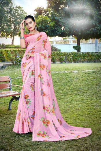 Grab This Pretty Elegant Looking Designer Printed Saree In Light Color Paired With Contrasting Colored Blouse. This Saree Are Chiffon And Blouse Are Silk Based Beautified With Printed. Buy Now.