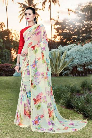 Grab This Pretty Elegant Looking Designer Printed Saree In Light Color Paired With Contrasting Colored Blouse. This Saree Are Chiffon And Blouse Are Silk Based Beautified With Printed. Buy Now.