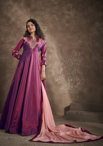 Flaunt Your Rich And Elegant Taste Wearing This Designer Readymade Long Gown In Burgundy Color With Peach Color Dupatta. This  Pretty Gown Is Fabricated On Triva Silk With Inner Beautified With Thread Work And Cinon Fabriced Dupatta. Its Fabric Is Soft Towards Skin And Easy To Carry All Day Long. 