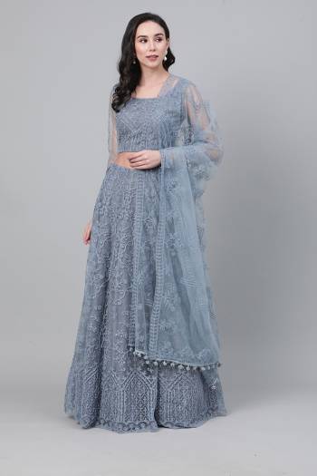 Heavy Designer Embroidery Lehenga Choli In Grey Color Fabricated On Net Beautified With Heavy Attractive Thread,Jari And Stone Work Embroidery. 