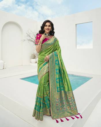 For A Proper Traditional Look, Grab This Designer Silk Based Heavy Weaved Saree In Dark Fine Color. This Saree Are Banarasi Silk Wevon Jacquard And Blouse Are Fabricated On Raw Silk Beautified With Heavy Embroidery And Stone Work. Buy Now