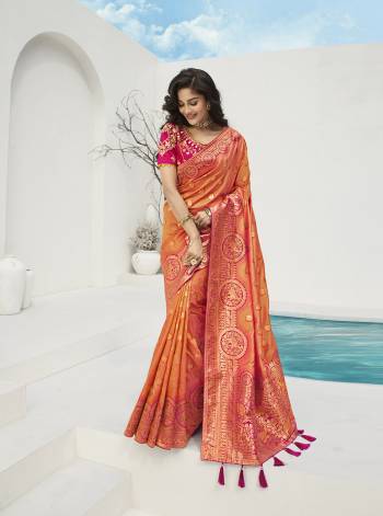 For A Proper Traditional Look, Grab This Designer Silk Based Heavy Weaved Saree In Dark Fine Color. This Saree Are Banarasi Silk Wevon Jacquard And Blouse Are Fabricated On Raw Silk Beautified With Heavy Embroidery And Stone Work. Buy Now