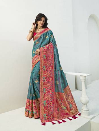 For A Proper Traditional Look, Grab This Designer Silk Based Heavy Weaved Saree In Dark Fine Color. This Saree Are Banarasi Silk Wevon Jacquard And Blouse Are Fabricated On Raw Silk Beautified With Heavy Embroidery And Stone Work. Buy Now