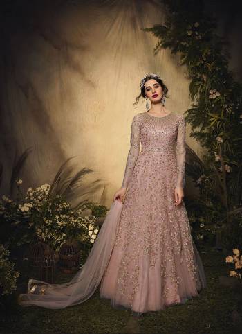 Look Pretty This Designer Floor Length Suit In Lovely Color.?Its Pretty Self Heavy Thread,Sequance Embroidred Top Net Based Paired With Santoon Bottom And Net Fabricated Dupatta Which Gives An Attractive To The Suit.