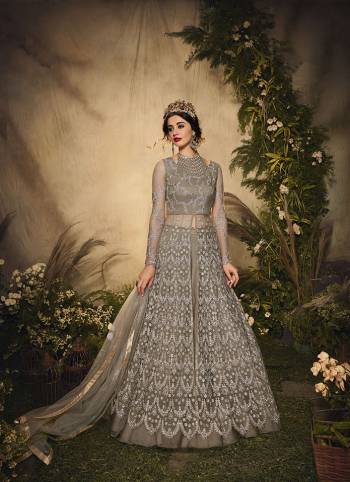 Look Pretty This Designer Floor Length Suit In Lovely Color.?Its Pretty Self Heavy Thread,Sequance Embroidred Top Net Based Paired With Santoon Bottom And Net Fabricated Dupatta Which Gives An Attractive To The Suit.