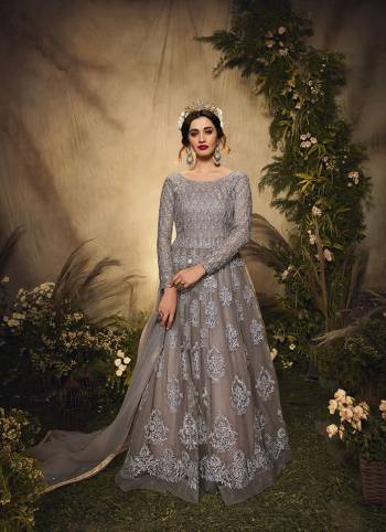 Look Pretty This Designer Floor Length Suit In Lovely Color.?Its Pretty Self Heavy Thread,Sequance Embroidred Top Net Based Paired With Santoon Bottom And Net Fabricated Dupatta Which Gives An Attractive To The Suit.