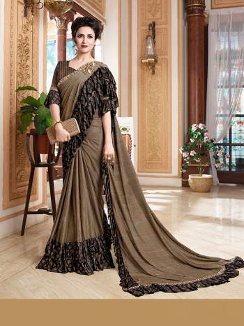 Add This Trendy Designer Ruffle Saree To Your Wardrobe In English Color. This Pretty Saree Is Fabricated On Imported Paired With Blouse. It Is Beautified With Pretty Ruffles And Hand Embroidered Patch Work.

