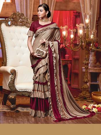 Adorn The Pretty Angelic Look Wearing This Heavy Hand Designer Saree In Dusty Color Paired With Contrasting Colored Blouse. This Saree Is Fabricated On Importerd Lycara Paired With Blouse. Its Pretty Color Pallete Will Give An Attractive Look To Your Personality. 