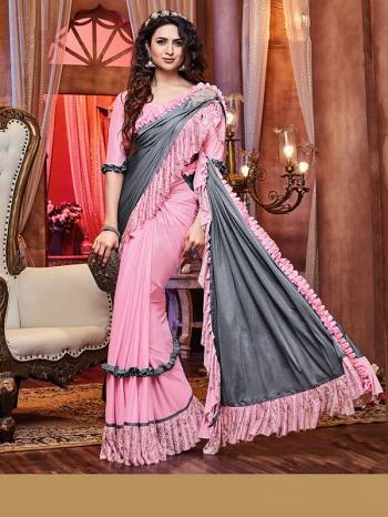 Adorn The Pretty Angelic Look Wearing This Heavy Hand Designer Saree In Dusty Color Paired With Contrasting Colored Blouse. This Saree Is Fabricated On Importerd Lycara Paired With Blouse. Its Pretty Color Pallete Will Give An Attractive Look To Your Personality. 