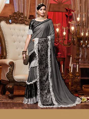 Adorn The Pretty Angelic Look Wearing This Heavy Hand Designer Saree In Dusty Color Paired With Contrasting Colored Blouse. This Saree Is Fabricated On Importerd Lycara Paired With Blouse. Its Pretty Color Pallete Will Give An Attractive Look To Your Personality. 