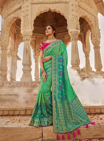 Look Attractive Wearing This Heavy Wevon Jacquard Saree Paired With Heavy Embroidery Blouse.  This Heavy Designer Saree Is Banarasi Silk Based And Blouse Are Raw Silk.Which Gives A Rich Look To Your Personality. Buy This Pretty Saree Now.