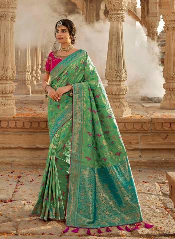 Look Attractive Wearing This Heavy Wevon Jacquard Saree Paired With Heavy Embroidery Blouse.  This Heavy Designer Saree Is Banarasi Silk Based And Blouse Are Raw Silk.Which Gives A Rich Look To Your Personality. Buy This Pretty Saree Now.