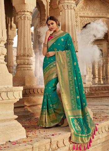 Look Attractive Wearing This Heavy Wevon Jacquard Saree Paired With Heavy Embroidery Blouse.  This Heavy Designer Saree Is Banarasi Silk Based And Blouse Are Raw Silk.Which Gives A Rich Look To Your Personality. Buy This Pretty Saree Now.