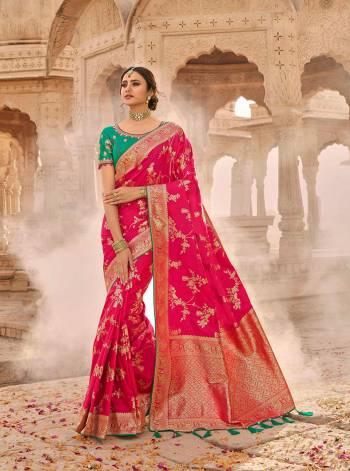 Look Attractive Wearing This Heavy Wevon Jacquard Saree Paired With Heavy Embroidery Blouse.  This Heavy Designer Saree Is Banarasi Silk Based And Blouse Are Raw Silk.Which Gives A Rich Look To Your Personality. Buy This Pretty Saree Now.