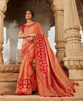 Look Attractive Wearing This Heavy Wevon Jacquard Saree Paired With Heavy Embroidery Blouse.  This Heavy Designer Saree Is Banarasi Silk Based And Blouse Are Raw Silk.Which Gives A Rich Look To Your Personality. Buy This Pretty Saree Now.