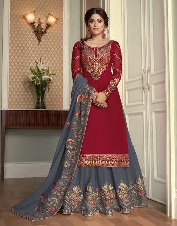 For A Bold And Beautiful Look, Grab This Heavy Designer Suit In Fine Color Paired With Dupatta. Its Top, And Dupatta Are Fabricated On Real Georgette And Bottom Are Santoon Beautfied With Embroidery. Buy This Semi-Sitched Suit Now. 

