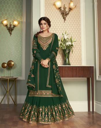 For A Bold And Beautiful Look, Grab This Heavy Designer Suit In Fine Color Paired With Dupatta. Its Top, And Dupatta Are Fabricated On Real Georgette And Bottom Are Santoon Beautfied With Embroidery. Buy This Semi-Sitched Suit Now. 

