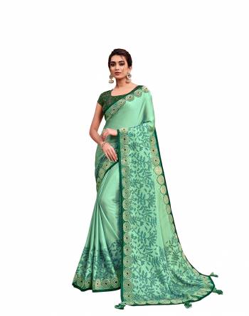Adorn The Pretty Angelic Look Wearing This Heavy Designer Saree In Fine Paired With Contrasting Colored Blouse. This Saree Is Fabricated On Silk Georgette Paired With Raw Silk,Net Fabricated Blouse. Its Pretty Color Pallete Will Give An Attractive Look To Your Personality. 