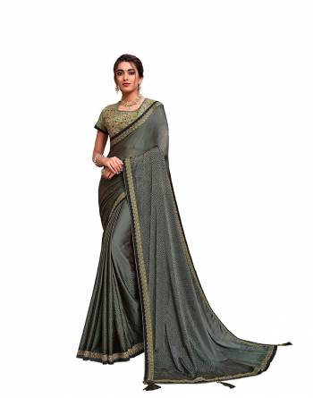 Adorn The Pretty Angelic Look Wearing This Heavy Designer Saree In Fine Paired With Contrasting Colored Blouse. This Saree Is Fabricated On Silk Georgette Paired With Raw Silk Fabricated Blouse. Its Pretty Color Pallete Will Give An Attractive Look To Your Personality. 