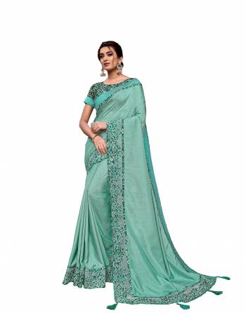 Adorn The Pretty Angelic Look Wearing This Heavy Designer Saree In Fine Paired With Contrasting Colored Blouse. This Saree Is Fabricated On Dual Tone Silk Paired With Printed Silk Fabricated Blouse. Its Pretty Color Pallete Will Give An Attractive Look To Your Personality. 