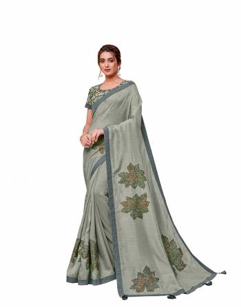 Adorn The Pretty Angelic Look Wearing This Heavy Designer Saree In Fine Paired With Contrasting Colored Blouse. This Saree Is Fabricated On Silk Paired With Raw Silk Fabricated Blouse. Its Pretty Color Pallete Will Give An Attractive Look To Your Personality. 