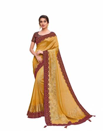Adorn The Pretty Angelic Look Wearing This Heavy Designer Saree In Fine Paired With Contrasting Colored Blouse. This Saree Is Fabricated On Silk Georgette Paired With Silk Fabricated Blouse. Its Pretty Color Pallete Will Give An Attractive Look To Your Personality. 