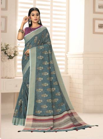 Grab This Pretty Elegant Looking Designer Saree In Dusty Color Paired With Contrasting Colored Blouse. This Saree And Blouse Are Linen Based Beautified With Weaving Designer. Buy Now.