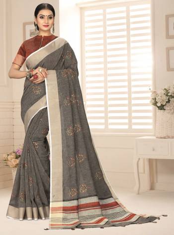 Grab This Pretty Elegant Looking Designer Saree In Dusty Color Paired With Contrasting Colored Blouse. This Saree And Blouse Are Linen Based Beautified With Weaving Designer. Buy Now.