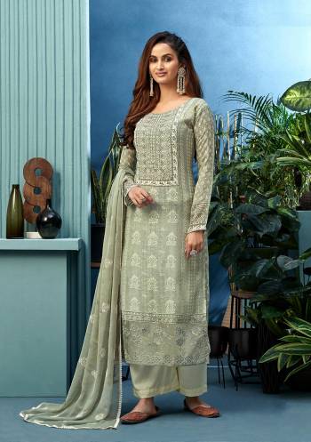 Look Pretty This Designer Floor Length Suit In Lovely  Color.?Its Pretty Digital Print,Embroidred And Additoial Hand Work Top Is Muslin Based Paired With Viscose Sntoon Bottom And Viscose Chiffon Fabricated Embroidered Dupatta Are Sequance Work Which Gives An Attractive To The Suit.