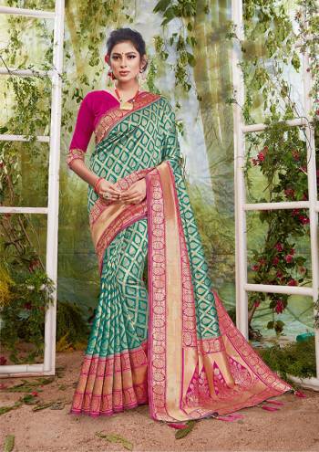 Flaunt Your Rich And Elegant Taste In This Rama Colored Saree Paired With Pink Colored Blouse. This Saree And Blouse Are Fabricated On Silk Beautified With Weave. Buy This Saree Now.