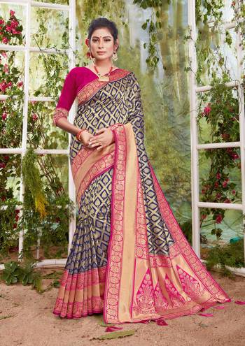 Flaunt Your Rich And Elegant Taste In This Nevy Blue Colored Saree Paired With Pink Colored Blouse. This Saree And Blouse Are Fabricated On Silk Beautified With Weave. Buy This Saree Now.