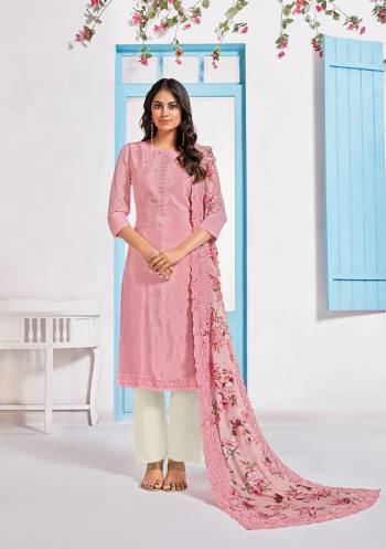 Grab This Very Pretty Designer Straight Suit In Grey Colored Top Paired With White Colored Bottom And Grey Colored Dupatta. Its Top Is Fabricated On Chinon Paired With Crepe Bottom And Chiffon Fabricated Dupatta. Its Pretty Floral Prints And Tone To Tone Embroidery Gives An Elegant Look To Your Personality. 