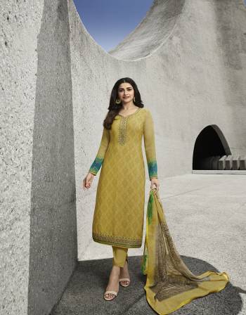 Add This Very Pretty Suit To Your Wardrobe In Yellow Color. This Designer Straight Suit Is Crepe Based Paired With Santoon Bottom and Chiffon Dupatta. Its Fabrics Are Soft Towards Skin, Light Weight And Easy To Carry Through out The Gala. 