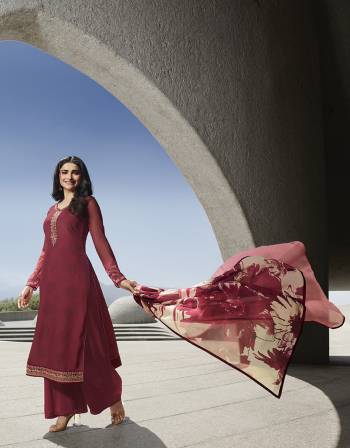 Rich And Elegant Looking Designer Straight Suit Is Here In Maroon Color. Its Pretty Top Is Crepe Based Paired With Santoon Bottom And Chiffon Dupatta.It Is Beautified With Prints And Attractive Embroidery. 