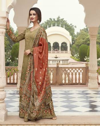 Attractive This Pretty Digital Printed Dress Material In Dusty Color. Its Top Are Modal Satin Silk And Bottom Are Fabricated On Dull Santoon Paired With Viscose Muslin Jacquard Fabricated Dupatta. Get This Stitched As Per Your Desired Fit And Comfort.