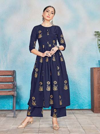 This Designer Readymade Suit In Lovely Dark Color.?Its Pretty Foil Print Top Is Rayon Based Paired With Rayon Bottom. Which Gives An Attractive To The Suit.