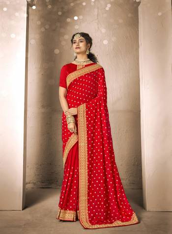 Adorn The Pretty Angelic Look Wearing This Heavy Jari Embroidery Designer Saree In Red Color Paired With Contrasting Red Colored Blouse. This Saree Is Fabricated On Vichitra Silk Paired With Blouse. Its Pretty Color Pallete Will Give An Attractive Look To Your Personality. 